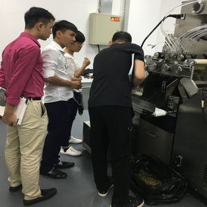 Customer from Vietnam inspecting full automatic encapsulataion machine