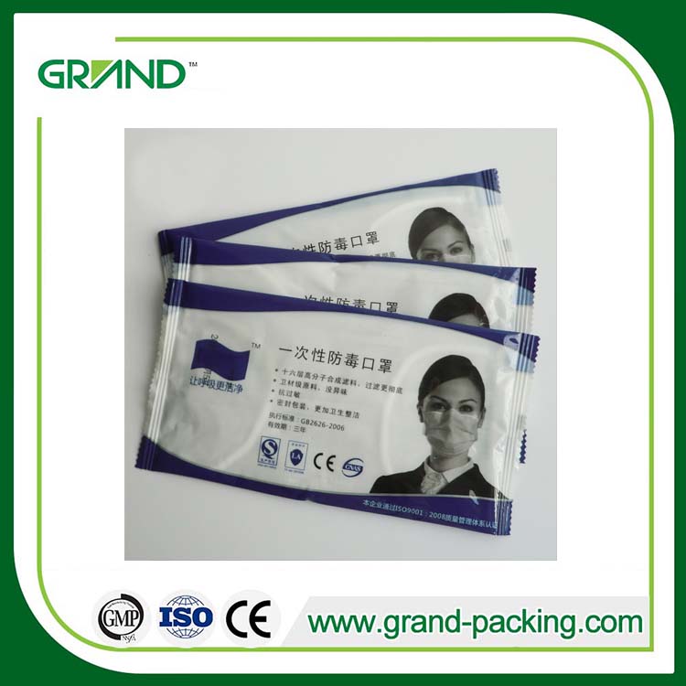 Face mask flow packing machine