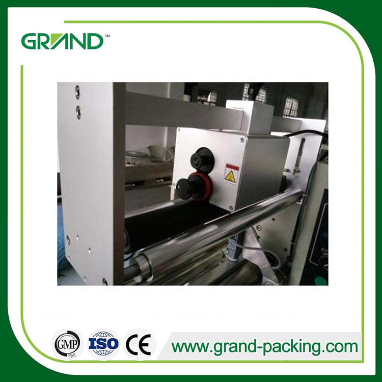 Face mask flow packing machine
